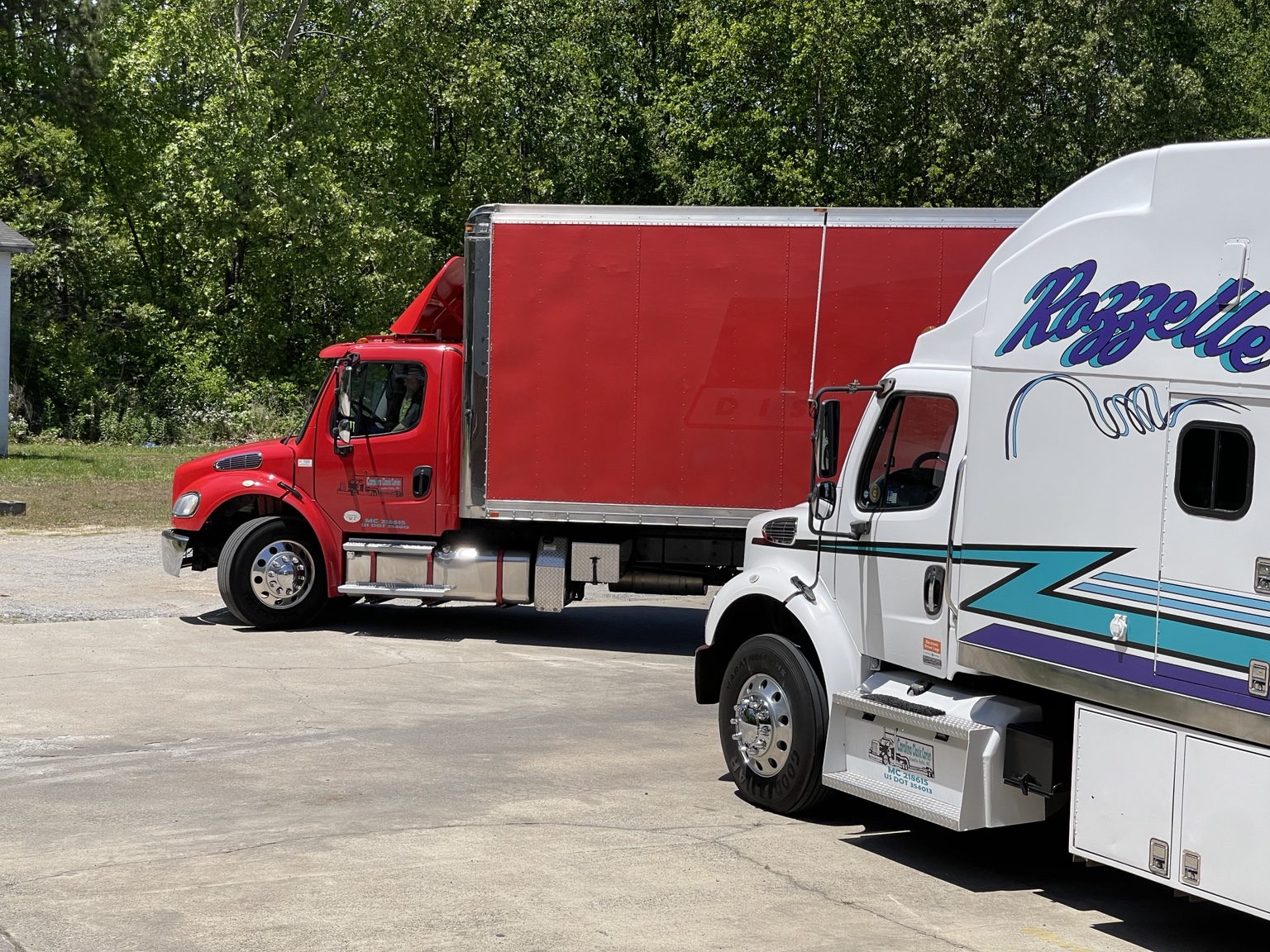 Red and white fleet trucks